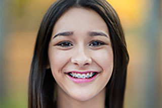 Smiling girl with braces