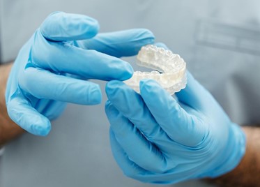 clear aligner invisalign in hands of top orthodontist